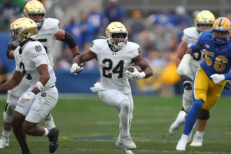 Classificando os 10 melhores running backs no Draft da NFL.webp
