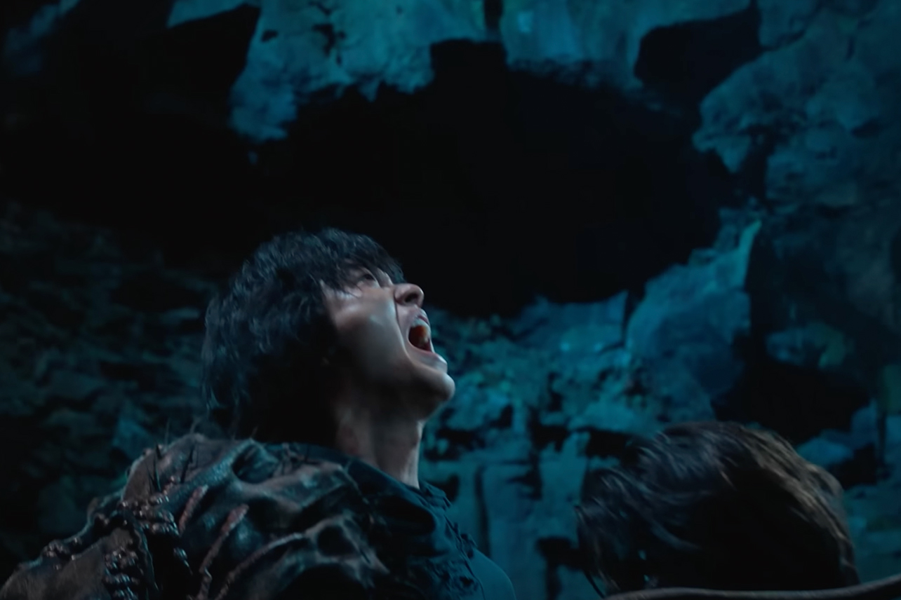 Man screaming up at night near large rocks in Sweet Home season 3