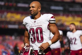 Austin Ekeler Faces Setback with Achilles Injury During Packers Clash.webp
