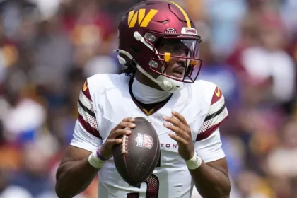 Unpacking Jayden Daniels Incredible Hail Mary Against the Bears The.webp