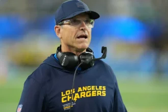 Exploring Jim Harbaughs Performance in Postseason Playoffs.webp