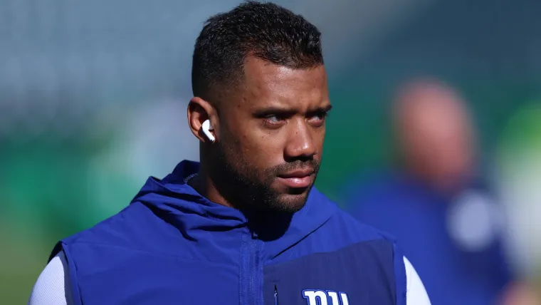 Russell Wilson Commends Sam Darnolds Motivational Resurgence on the Field.webp