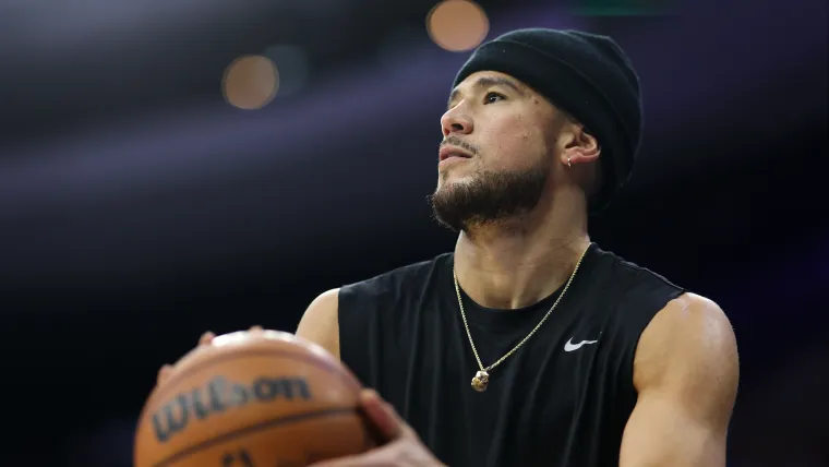 Devin Booker Remains Indecisive About Participating in Consecutive Games for.webp