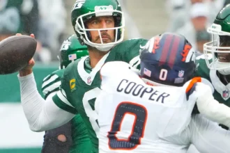 Aaron Rodgers Highly Unlikely to Join Broncos Amidst Outlandish Speculation.webp