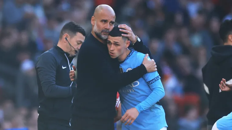 Pep Guardiola chi trich fan Man United vi Thieu lop.webp